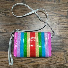 Multicolored Zipper Crossover Purse/Wristlet Long Strap To Wear On Shoulder Or You Can Detach And Use As A Wristlet Never Used Trendy Multicolor Wristlet With Wrist Strap, Multicolor Rectangular Wristlet With Zipper Closure, Multicolor Rectangular Wristlet For Gift, Rectangular Multicolor Wristlet With Zipper Closure, Multicolor Rectangular Wristlet With Strap, Multicolor Rectangular Wristlet With Zipper, Multicolor Rectangular Wristlet With Wrist Strap, Multicolor Rectangular Wristlet Gift, Multicolor Wristlet With Zipper Closure As Gift