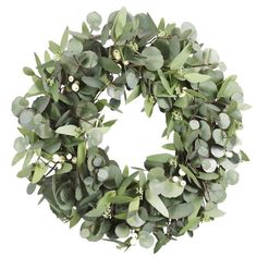 a wreath with green leaves and white berries