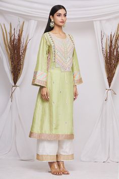 Olive green kurta with paisley and floral embroidered motifs. Paired with pant and dupatta.
Components:3
Pattern:Embroidered
Type of Work:Floral,paisley motifs
Neckline:Round
Sleeve Length:Long sleeves
Fabric:Silk,organza
Color:Green
Other Details:
Embroidered border
Cutwork border
Sheer dupatta
Tassel border
Occasion:Mehendi and Haldi - Aza Fashions Sheer Dupatta, Paisley Motifs, Kurta Set For Women, Embroidered Motifs, Embroidered Border, Silk Organza, Fabric Silk, Kurta Set, Green Silk