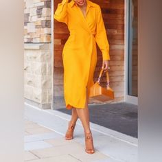 The Tangerine Color Of This Zara Tunic Is Beyond Amazing. The Tunic Dress Is One Of The Best Pieces Made By Zara. Dress Has Very High Side Slits Including The Front Opening From The Wrap Detail. Can Be Worn As A Dress Or Tie Front Panel And Worn With Jeans. Nwot In Great Condition. Yellow V-neck Midi Dress For Work, Fitted Long Sleeve Midi Dress For Day Out, Fitted Midi Length Shirt Dress, Fitted Yellow Knee-length Shirt Dress, Yellow Fitted Long Sleeve Shirt Dress, Fitted Midi Dress With Surplice Neckline For Brunch, Fitted Yellow Long Sleeve Shirt Dress, Fitted Long Sleeve Yellow Shirt Dress, Spring Wrap Dress For Night Out, Midi Length