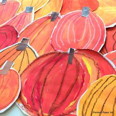 an art project with paper cut out pumpkins