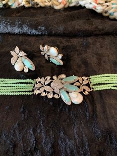 This gorgeous Choker necklace with earrings can add glamour to your occasion wear. Choker Designs, Statement Choker, Stone Choker, Light Earrings, Sea Green, Earrings Photo, Brass Jewelry, Pearl Drop, Statement Earrings