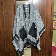 Can Fit As An Oversized Size Small Or Average Medium. Never Worn. Gray Poncho For Cold Weather In Fall, Oversized Gray Poncho For Winter, Gray Oversized Poncho For Winter, Gray One Size Fall Cape, Oversized Gray Poncho For Fall, Oversized Cozy Black Poncho, Cozy Oversized Black Poncho, Oversized Black Poncho For Cold Weather, Casual Black Shawl Poncho