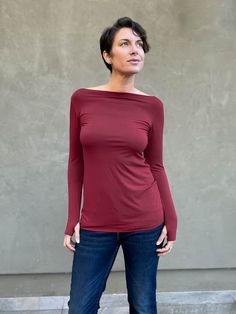 caraucci women's long sleeve natural rayon jersey maroon boatneck long sleeve top #color_wine Basic Long Sleeve Tops With Thumbholes, Fall Scoop Neck Long Sleeve Top For Everyday, Basic Fitted Long Sleeve Top For Everyday, Fitted Tops With Thumbholes For Everyday Wear, Fall Long Sleeve Scoop Neck Top For Layering, Fall Long Sleeve Top For Layering With Scoop Neck, Casual Tops With Thumbholes For Fall, Basic Solid Color Tops For Fall, Basic Solid Tops For Fall