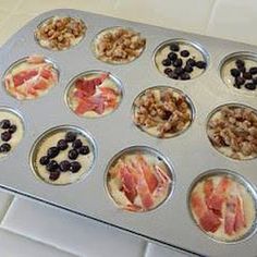 a pan filled with different types of food on top of a white tile countertop