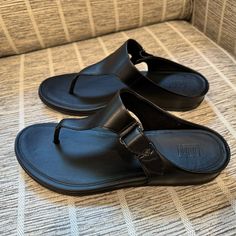 Fitflop Vera Toe-Post Sandals - All Black - Size Euro 42/Us 10 - New In Box! Out Of Stock Style! Built On Ergonomic All-Day-Cushioning Supercomff Midsoles With Minimalist Upper That Curves To The Shape Of The Foot And Easy On And Off Fastenings. These Are A Must Have! Size: Euro 42/Us 10 Condition: New In Box Smoke Free Home Black Synthetic Flip Flops With Leather Footbed, Black Toe Loop Sandals With Arch Support, Black Toe Post Sandals With Arch Support, Black Toe Post Flip Flops With Rubber Sole, Black Toe Loop Sandals With Cushioned Footbed, Black Flip Flops With Leather Footbed, Black Open Toe Flip Flops With Heel Loop, Black Leather Footbed Flip Flops With Toe Loop, Black Leather Flip Flops With Comfort Insole