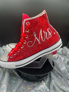 Our shoes have something to SAY! We specialize in All. Things. Blinged! Any event. Any customization you can think of we can bring to life! Message us for more information. You can also see more pictures and products at www.mykicksbling.com. PLEASE READ In the order notes section, please indicate your NEED BY date as well as the design you have in mind. The pictures in the listing change positions so pic #4 may be #2 tomorrow so please specify the design. You can screen shot and message me with Bedazzled Chucks, Decorated Sneakers, Wedding Assesories, Sequin Converse, Bling Sneakers, Biker Wedding, Bridal Sneakers, Tie Sneakers, Bling Converse