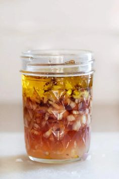 a jar filled with food sitting on top of a table