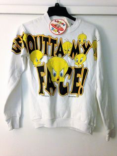 55% cotton - 45% polyester Machine wash cold inside out, tumble dry low Angry Tweety "Get Outta My Face" Made in El-Salvador Fun Cotton Sweatshirt With Character Print, Casual Cartoon Print Sweatshirt For Fans, Vintage Crew Neck Tops For School, Retro Winter Tops With Cartoon Print, Retro Cotton Sweatshirt With Cartoon Print, Retro Cartoon Print Sweatshirt, White Cartoon Print Sweatshirt For Fan Merchandise, Retro Winter Fan Merchandise Tops, Vintage White Top For School