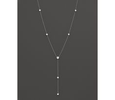 Diamond Station Lariat Necklace in 14K White Gold, 16" | Bloomingdale's White Gold Sterling Silver Lariat Backdrop Necklace, Fine Jewelry White Gold Long Drop Diamond Necklace, Fine Jewelry Long Drop White Gold Diamond Necklace, Elegant Silver Station Necklace With Single Cut Diamonds, Sterling Silver Lariat Diamond Necklace Fine Jewelry, Silver Fine Jewelry Lariat Necklace With Diamond Cut, Silver Diamond Cut Lariat Necklace, Silver Diamond Cut Lariat Necklace In Fine Jewelry Style, Classic White Gold Lariat Diamond Necklace