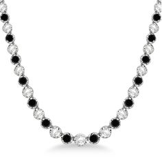 Black Luxury Chain Necklace, Luxury Black Diamond Necklace In Elegant Style, Luxury Black Diamond Necklaces, White Gold Round Tennis Necklace, Round White Gold Tennis Necklace, Black Diamond Jewelry With Prong Setting, Classic Black Jewelry With Black Diamonds, Black Round Cut Cubic Zirconia Jewelry, Elegant Jewelry With Round Cut Black Diamonds