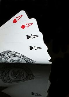 the ace runaway by anncakty is shown in red and black, with four playing cards stacked on top of each other