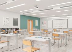 an empty classroom with desks and chairs