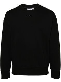 black cotton-modal blend jersey texture ribbed crew neck logo print to the front drop shoulder long sleeves ribbed cuffs and hem French terry lining Calvin Klein Casual Crew Neck Sweater, Casual Calvin Klein Crew Neck Sweater, Casual Black Sweater With Logo Detail, Modern Crew Neck Tops With Ribbed Cuffs, Classic Black Sweater With Logo Print, Modern Sweater With Ribbed Cuffs For Streetwear, Modern Crew Neck Sweatshirt With Logo Print, Classic Calvin Klein Crew Neck Top, Modern Crew Neck Sweatshirt With Ribbed Cuffs