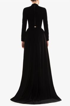 The black velvet long dress from Saiid Kobeisy presents a sophisticated silhouette, complete with long sleeves and a unique bust cut-out. A pleated skirt flows into a train, enhanced by a matching belt for a refined touch.

- Gender: Women  
- Fabric: Velvet  
- Features: Long sleeves, cut-out bust, pleated envelope skirt, matching belt Black Velvet Dress With Train, Long Black Velvet Skirt, Long Hooded Velvet Dress, Long Sleevs Black Velvet Dress, Black Velvet A-line Dress, Envelope Skirt, Saiid Kobeisy, Velvet Dress Long, Black Maxi