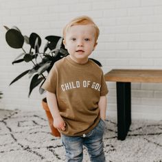 This 100% cotton Child of God Toddler Tee is perfect for encouraging your little one to embrace their faith. It is comfortable and stylish, made with soft, breathable fabric to ensure they stay comfortable all day long. A great addition to any wardrobe! Child Of God, Long A, Toddler Tees, Christian Clothing, Faith Based, Little One, Breathable Fabric, Kids Tshirts, Encouragement