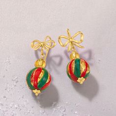 Ross-Simons - Italian Multicolored Murano Glass Christmas Ornament Bead Drop Earrings Over. Direct from Italy, these Murano glass Christmas ornament earrings are a beautiful sight! 14mm red and green Murano glass beads are handcrafted with care, with gleaming golden flecks for an artisanal look that's warm and bright. Finishes with 6.5mm 18kt yellow gold over sterling silver bead tops, ribbons and earwire backings. Murano glass is unique and will vary. Hanging length is 1 1/2". Multicolored Murano glass Christmas ornament bead drop earrings. Festive Beaded Earrings For Gift, Elegant Holiday Earrings For Festive Occasions, Elegant Festive Holiday Earrings, Elegant Holiday Festive Earrings, Christmas Drop Earrings For Celebration, Gold Holiday Drop Earrings, Christmas Celebration Drop Earrings, Festive Christmas Earrings, Festive New Year Dangle Earrings