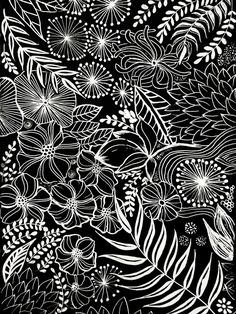 a black and white floral background with lots of flowers in the center, on a dark background