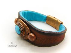 Beautiful one of a kind handcrafted southwestern leather bracelet made of earthy mid-western style brown dyed veg tan leather. The focal point is a natural stabilized Tibet turquoise with a bezel setting in solid copper. Rustic Turquoise Leather Bracelet, Brown Bohemian Leather Bracelet With Concho, Turquoise Leather Bohemian Cuff Bracelet, Bohemian Turquoise Leather Cuff Bracelet, Artisan Turquoise Leather Cuff Bracelet, Brown Southwestern Jewelry With Patina, Southwestern Brown Jewelry With Patina, Turquoise Leather Cuff Bracelet Hand Tooled, Turquoise Hand Tooled Leather Cuff Bracelet