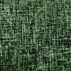 green and white textured fabric with small squares