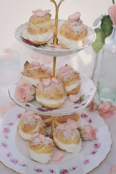 three tiered plates with pastries on them