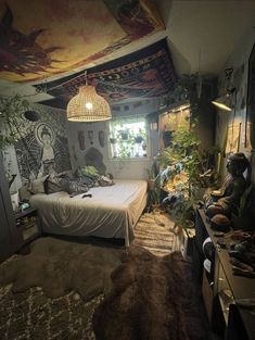 a bed room with a neatly made bed next to a window and plants on the wall