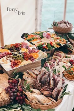 a table filled with lots of different types of food