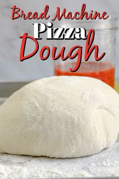 bread machine pizza dough sitting on top of a counter