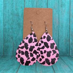 Handmade Pink Cow Print Faux Leather Earrings Teardrop Shape Drop Earrings Black And Pink Cow Print 2.25” Length Top To Bottom 1.5” Wide Double Sided New Trendy Pink Teardrop Earrings, Trendy Pink Dangle Teardrop Earrings, Cow Print Beaded Earrings, Cow Print Fringe Earrings, Cow Print Earrings, Pink Western Earrings, Pink Cowprint Earrings, Wood Cow Tag Earrings, Pearl Earrings Handmade