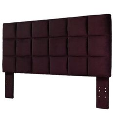 an upholstered headboard with multiple squares on the top and bottom, in dark purple