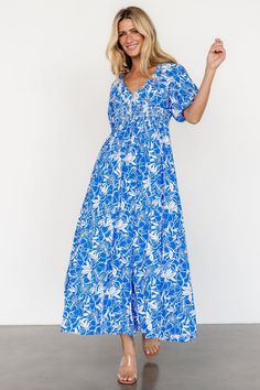 Elaine Maxi Dress | Blue + White V-neck Maxi Dress With Smocked Back For Vacation, Blue V-neck Maxi Dress With Smocked Back, Summer V-neck Maxi Dress With Elastic Waistband, Blue V-neck Dress With Smocked Bodice, Spring Beach Maxi Dress With Empire Waist, Blue Flowy Maxi Dress With Empire Waist, Blue Flowy Empire Waist Maxi Dress, Flowy Blue Maxi Dress With Empire Waist, Blue Maxi Dress For Vacation