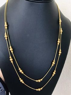 This Avon elegant two layered gold bead and chain swag necklace is 23 inches long on the inner layer. It is a pretty necklace and is marked Avon on the clasp. I specialize in finding fun wearable jewelry. Please browse my shop for more options. I box jewelry sales ready for gift giving. I Box, Wearable Jewelry, 80s Theme Party, Wire Cuff, Pretty Necklace, Pretty Necklaces, Sarah Coventry, Box Jewelry, Copper Bracelet