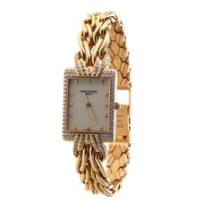 Patek Philippe La Flamme Gold Diamond Ladies Quartz Watch 4835/3. Watch is in great preowned condition, set on a original 18k gold bracelet. Weighs 93 grams. BRAND: Patek Philippe MODEL: La Flamme REF: 4835/3 CASE SIZE: Case 21mm x 29mm CASE MATERIAL: 18k Yellow Gold FUNCTIONS: Hours, Minutes CONDITION: ﻿Preowned, excellent condition BOX : No PAPERS : ﻿No Patek Phillipe Women, Luxury Coach Watch For Formal Occasions, Gold Ladies Watch, Watch Patek Philippe, Women Patek Philippe, Vintage Patek Philippe, Patek Philippe Women, Gold Watches, Watches Women Patek Philippe