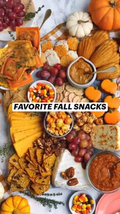 a table topped with lots of different types of snacks and desserts next to each other