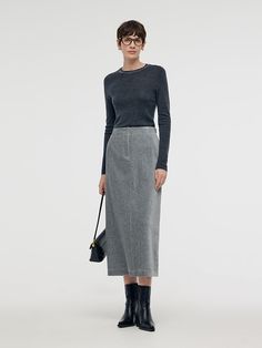 -Elastic -With metallic threads -With pockets This knitted skirt is made from soft, breathable cotton with great stretch and moisture-wicking properties. The addition of metallic threads enhances its subtle shine, while the grey color adds a touch of sophistication. Practical side pockets are perfect for small essentials, and the back slit design allows for easy movement. A versatile piece ideal for everyday wear during the fall and winter.Stretch Back Slit Knitted Women Midi SkirtGoodsNo: 1CSC2 Women Midi Skirt, Knitted Skirt, Stretch Back, Elastic Waist Skirt, Women Long Sleeve Tops, Women Midi, Dresses By Length, The Grey, Long Sleeve Midi