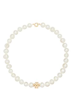 This classic cultured-pearl necklace is branded by the signature double Ts. 15 3/4" length Spring-ring closure Cultured pearl/goldtone plate Imported Tory Burch Kira, Cultured Pearl Necklace, Cultured Pearls, Spring Rings, Pearl Beads, Tory Burch, Pearl Necklace, Gold Tones, Nordstrom