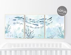 three watercolor paintings on the wall above a crib in a baby's room