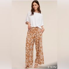 Wide Leg Pants Flower Pattern Chic Floral Print Wide Leg Pants For Vacation, Floral Print Trousers For Vacation, Floral Print Wide Leg Pants For Day Out, Floral Print High-waisted Wide Leg Pants For Day Out, Chic Floral Print Pants For Day Out, Floral Print Long Pants For Day Out, Relaxed Fit Floral Print Vacation Pants, Relaxed Fit Floral Print Pants For Vacation, Casual Relaxed Fit Floral Print Bottoms