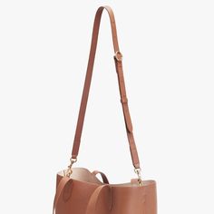 Women's Adjustable Strap in Beige | Pebbled Leather by Cuyana | Women's Adjustable Strap in Beige | Pebbled Leather by Cuyana Chic Adjustable Strap For Tote Bag, Versatile Leather Satchel With Adjustable Strap, Cognac Everyday Bag With Adjustable Strap, Everyday Cognac Bag With Adjustable Strap, Classic Bucket Bag With Detachable Strap For Everyday, Chic Bag Strap With Leather Handles For Daily Use, Modern Leather Bag Strap For Everyday Use, Classic Everyday Bucket Bag With Detachable Strap, Everyday Cognac Shoulder Bag With Detachable Strap