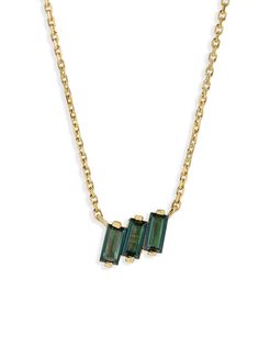 Minimal and modern, this stacked baguette necklace from KALAN By Suzanne Kalan is perfect for layering. It showcases three similar green topaz stones in an uneven pattern. This feminine pendant is perfect for layering. Handcrafted in 14-karat yellow gold. Detailed in green topaz.Diamonds total 0.05 carats. Baguette stones measure 4-mm. by 2-mm. Necklace adjust from 16-in. to 18-in. long. Finished with a lobster clasp. Luxury Gold Baguette Cut Emerald Necklace, Baguette Necklace, Topaz Yellow, Green Topaz, Suzanne Kalan, Yellow Gold Necklace, Topaz Stone, Winter Style, Autumn Winter Fashion