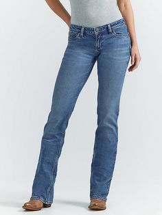 WOMEN'S BOOTCUT JEANS WITH A LOW-RISE, RETRO TWIST Combining the authentic Wrangler® details you know and love with new washes and fits, the Wrangler® Retro® collection strikes a contemporary chord while paying tribute to our Western roots. Affectionately known as Sadie, our women's low-rise bootcut jeans offer the comfort and durability you need as well as a stylish back pocket design for extra personality. women's low-rise jeans sit right at the hips, making them perfect for showing off a favo Denim Blue Straight Leg Bottoms For Rodeo, Straight Leg Denim Blue Jeans For Rodeo, Fitted Denim Jeans For Rodeo, Fitted Straight Leg Jeans For Rodeo, Western Fitted Straight Leg Jeans, Medium Wash Jeans For Rodeo With Standard Cut Leg, Fitted Jeans For Rodeo With Standard Cut Leg, Fitted Jeans For Rodeo With Standard Fit, Western Style Straight Leg Flare Jeans In Medium Wash