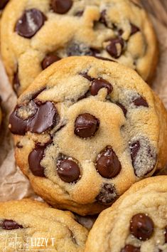 chocolate chip cookies are piled on top of each other