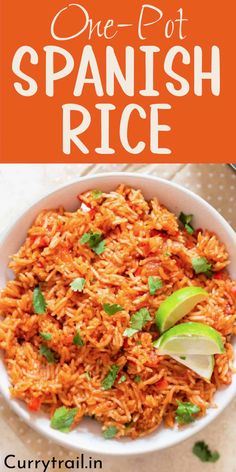 one pot spanish rice in a white bowl with cilantro and lime