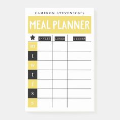 a printable meal planner with yellow and black stripes on the top, in front of a