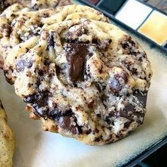 chocolate chip cookies on a baking sheet ready to be eaten