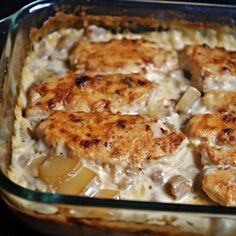 a casserole dish with chicken, potatoes and gravy