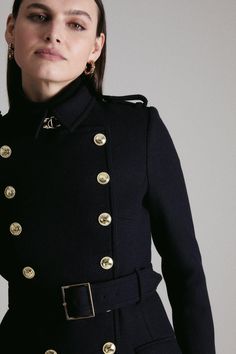 An Enduringly Elegant Mix Of Fine Italian Wool And Modern Military Design Details Make This Short  Belted Coat A Cover-Up To Covet. Detailed With Rows Of Glossy Gold-Tone Buttons, Structured Epaulettes And Roomy Flap Pockets, This Luxurious Design Looks Chic With Everything Already Hanging In Your Closet. Luxury Double-breasted Peacoat With Button Closure, Designer Workwear Peacoat With Button Closure, Luxury Double-breasted Wool Coat With Buttons, Luxury Office Outerwear With Gold Buttons, Luxury Double-breasted Peacoat For Work, Designer Double-breasted Pea Coat For Office, Luxury Winter Peacoat With Double-breasted Button Fastening, Luxury Double-breasted Outerwear With Gold Buttons, Luxury Winter Peacoat With Double-breasted Button