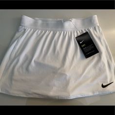 Nike Tennis Skirt Size Xs New Never Worn Nike Sporty Short Skirt, Nike Tennis Skirt For Spring, Nike Sporty Summer Skirt, Sporty Nike Skirt For Spring, Sporty Summer Skirt By Nike, Nike White Lined Skirt, Nike White Skirt For Spring, Nike Sporty White Skirt, Fitted White Nike Skirt