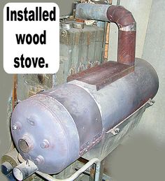 there is an old machine that has been installed in the wood stove for sale on ebay