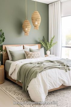 a bedroom with green walls and white bedding